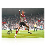 Chris Rigg Signed A4 Photo